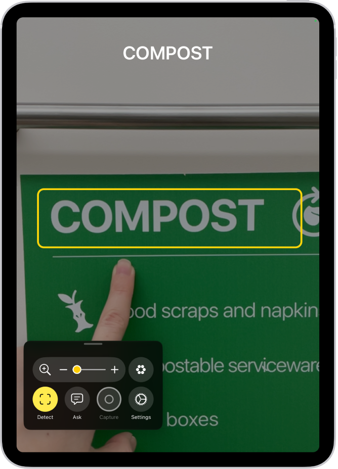 The Magnifier app detecting a finger pointing at text on a sign.