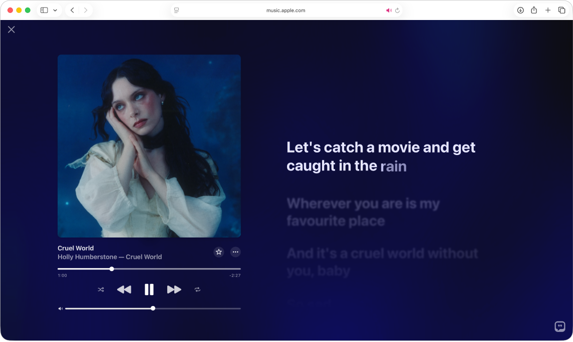 A song is playing in the Full Screen Player in Apple Music. Lyrics appear on the right, in time with the music.