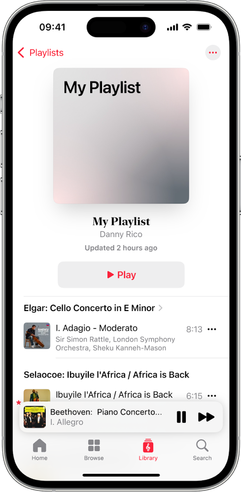 An iPhone showing a personal playlist in Apple Music Classical. At the top of the screen are album art, the name of the playlist and a Play button. The Mini Player is near the bottom of the screen, and shows the track that’s currently playing. Below the MiniPlayer are the Home, Browse, Library and Search buttons.