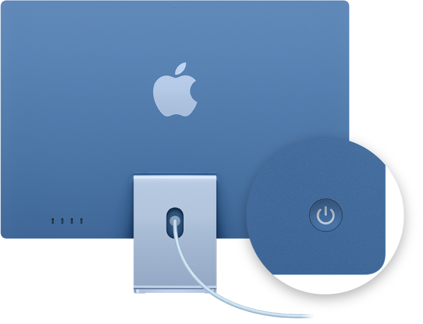 منظر خلفي لـ&nbsp;iMac مقاس 24 بوصة يركز بوضوح على زر الطاقة.
