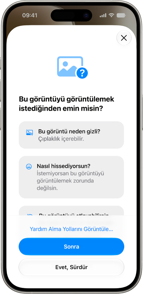 Bir görüntünün hassas olabileceği uyarısını ve yardım alma seçeneklerini gösteren İletişim Güvenliği ekranı.