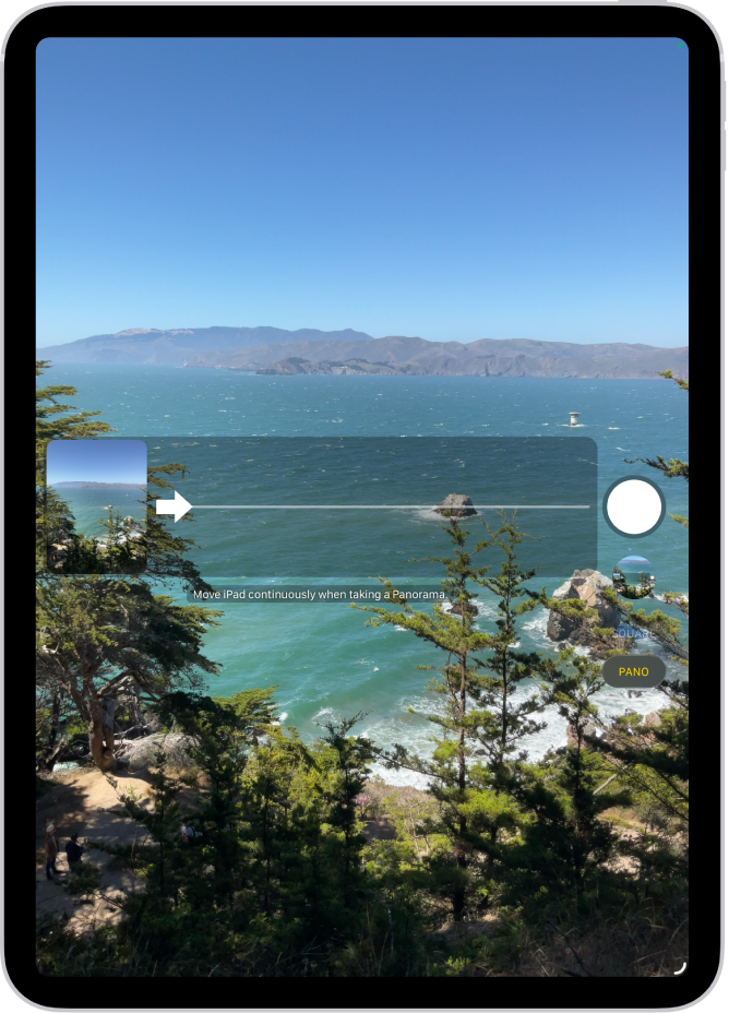 Cámara en modo Panorámica. Una flecha, a la izquierda del centro, apunta hacia la derecha para mostrar la dirección de la panorámica.