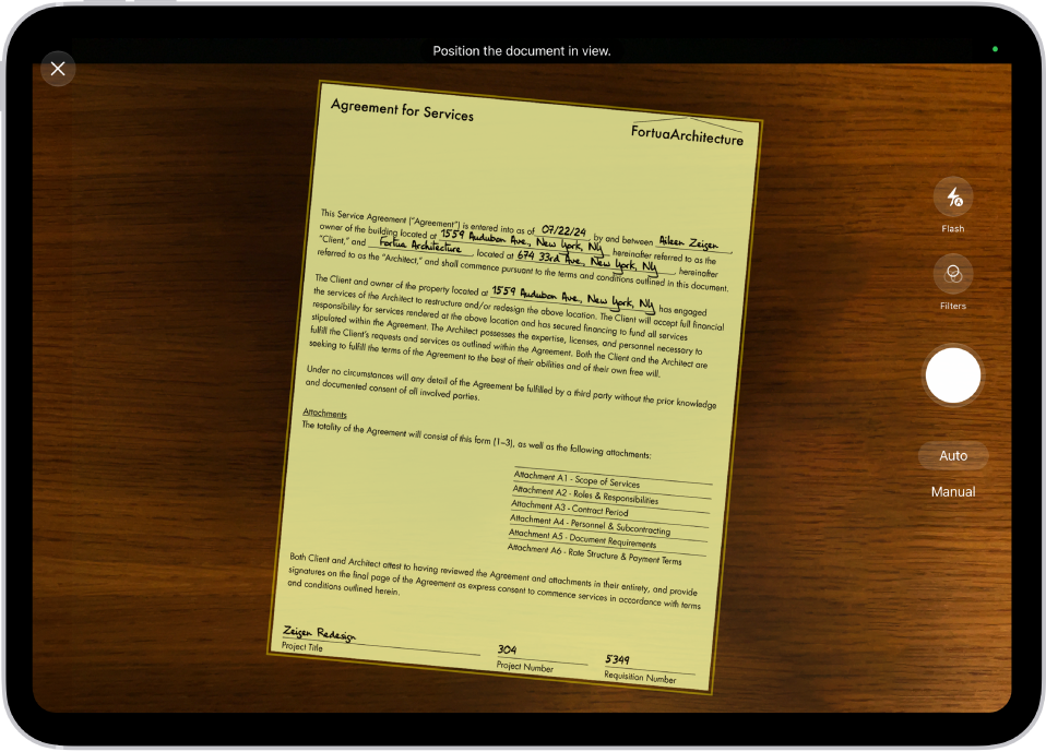 A screen showing a document being scanned. The Take Picture button is at the bottom center.